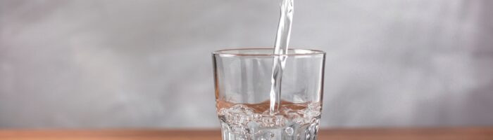 Glass,Of,Fresh,Water,On,The,Table.