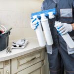 Plumber,Installing,Or,Repairing,System,Of,Water,Filtration.,Water,Purification